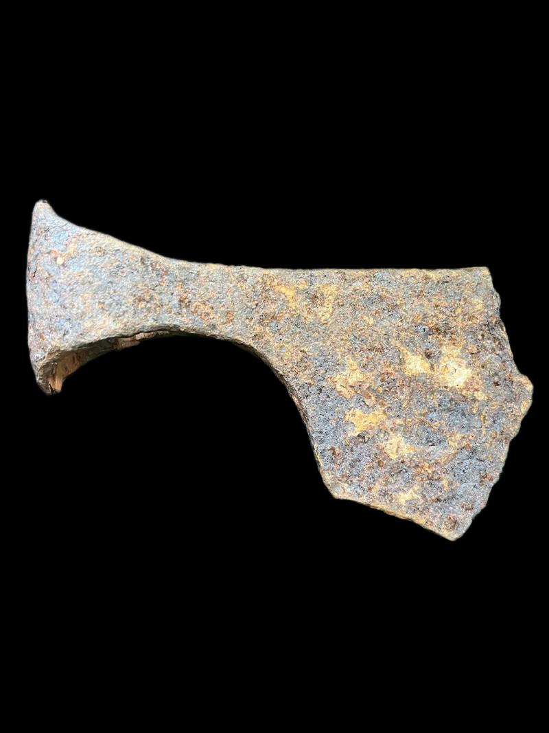 8TH-11TH CENTURY VIKING BATTLE AXE HEAD WITH WOOD REMAINING(BATTLE DAMAGED)